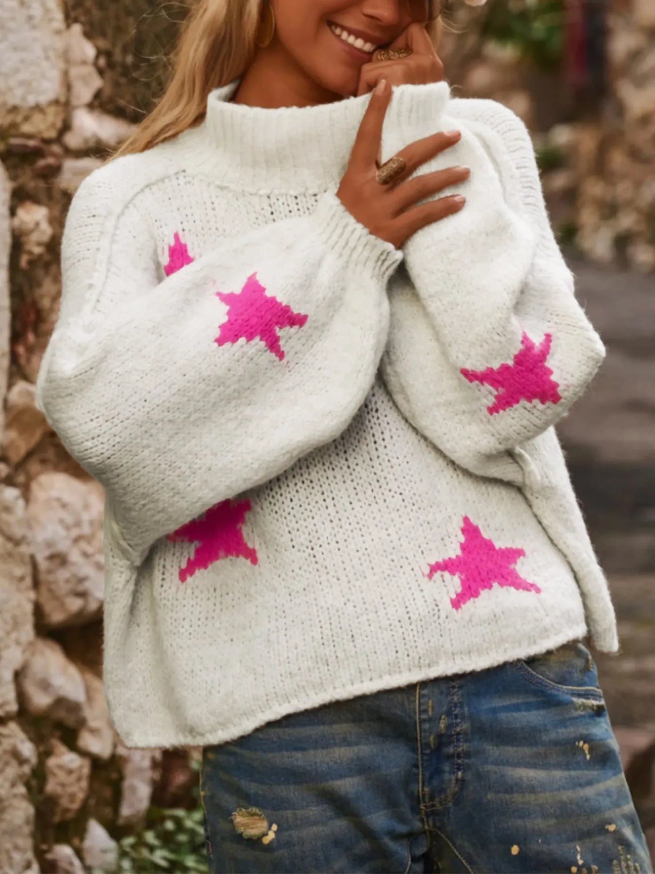 White women's loose turtleneck pullover sweater with five-pointed star pattern and contrast detailing