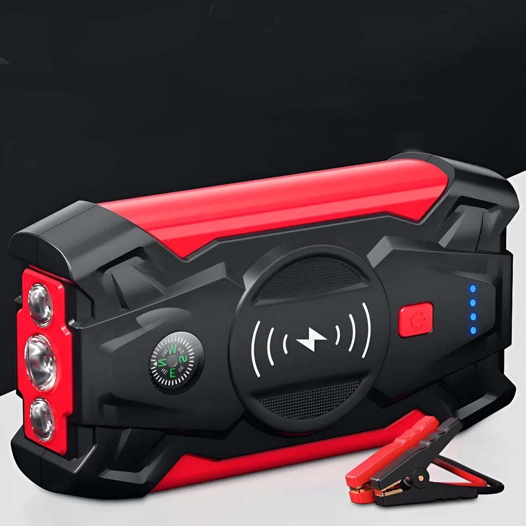 Red car emergency jump starter with digital display and battery clips showing 39800A peak current