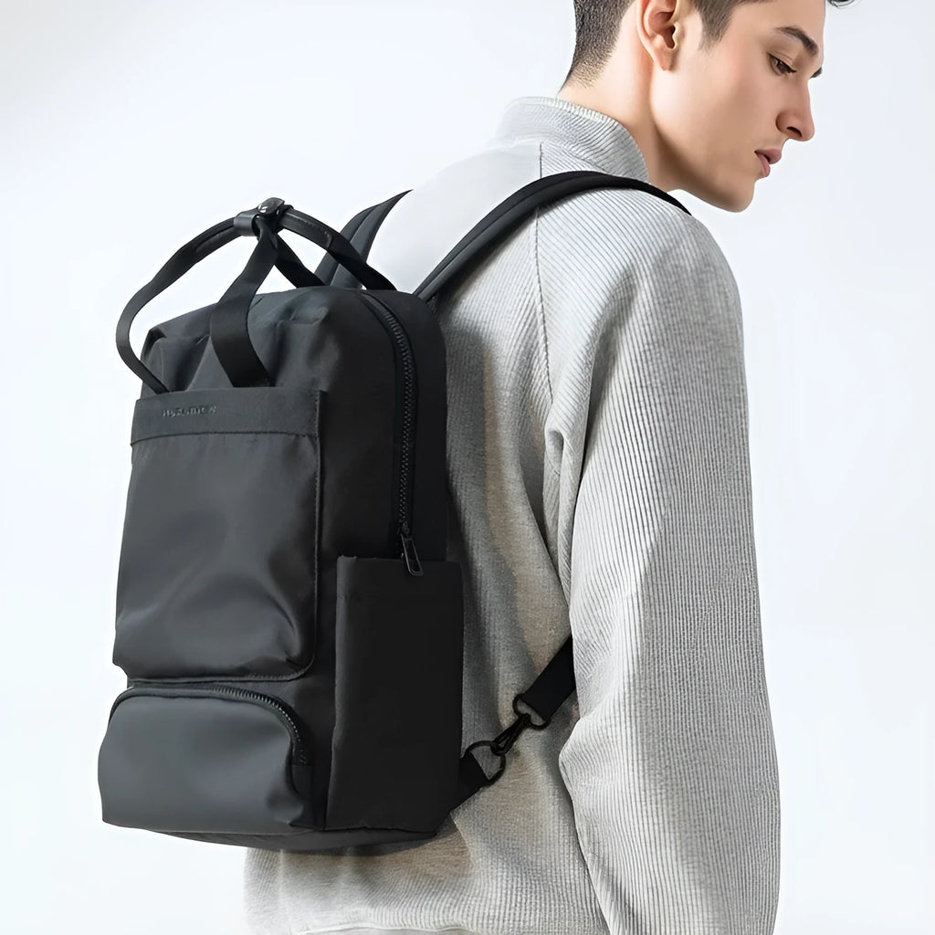 Elegant black Oxford cloth computer backpack with 20-35L capacity and polyester lining