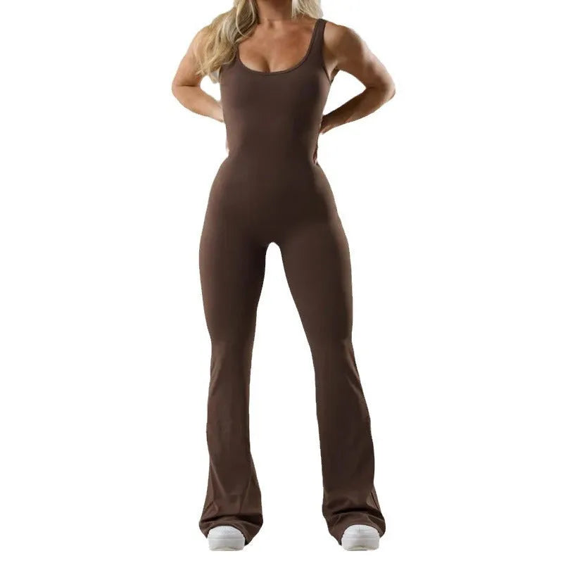 Women's black yoga bodysuit with seamless construction and mid waist design