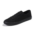 All black Korean style canvas flat work shoes for women with front lace-up and rubber sole