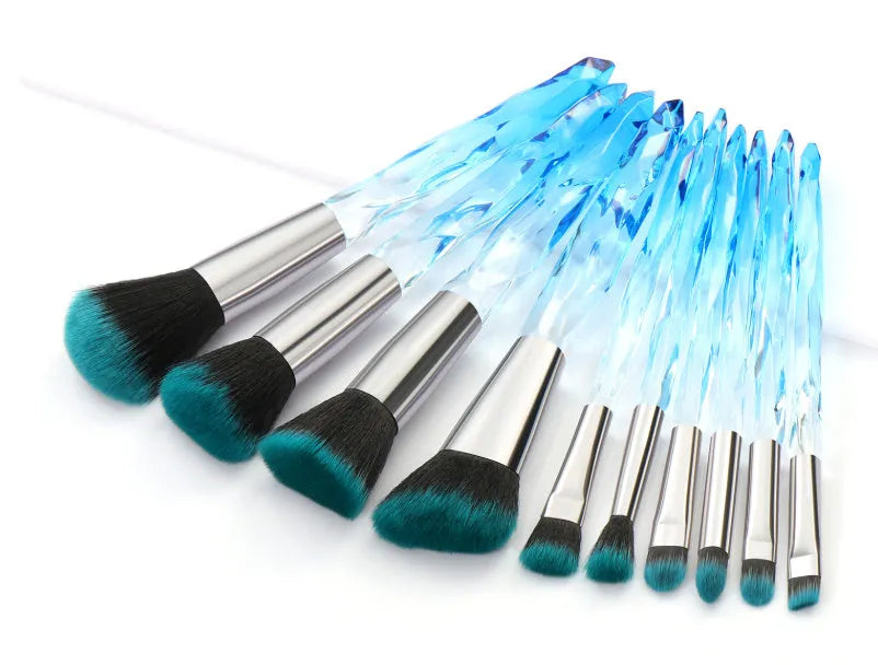 Ten crystal-handle foundation brushes with artificial fibre bristles in black, blue, red, and yellow colour options