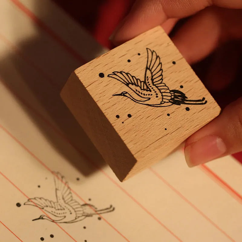 Mr. Paper wooden stamp seal with a crane design from the Huahegui series.