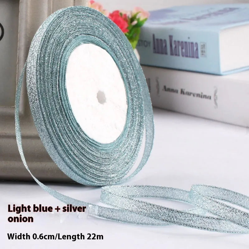Roll of 0.6cm wide polyester gift ribbon in a choice of colours, with 22 metres per roll.