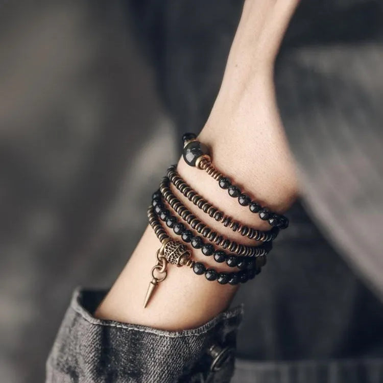 Black multi-layered beaded bracelet with geometric shape and natural retro styling