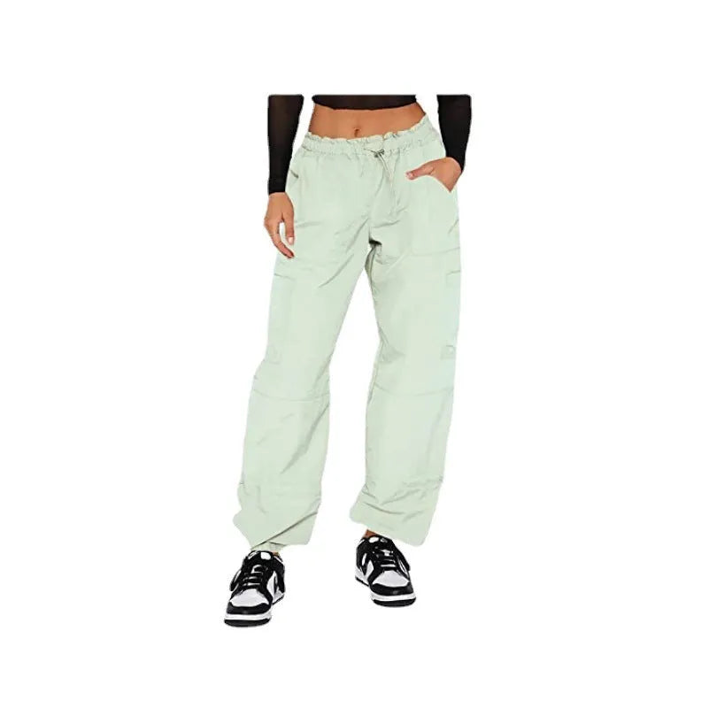 Multi-pocket cargo casual pants in a loose fit, shown in a neutral colour like grey or khaki.