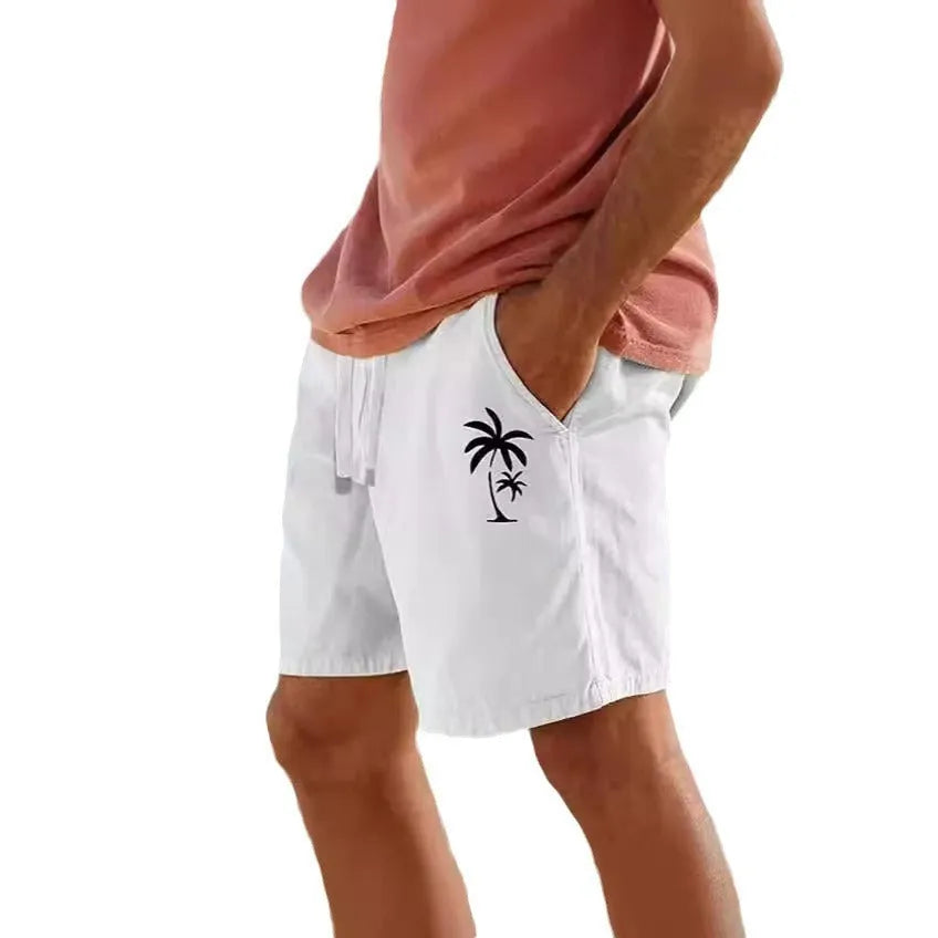Men's beige cotton blend drawstring shorts with a floral heat transfer patch on the leg