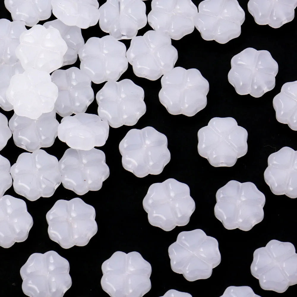 50 glass four-leaf clover beads in assorted colours with coloured glaze finish and 10mm straight hole design.