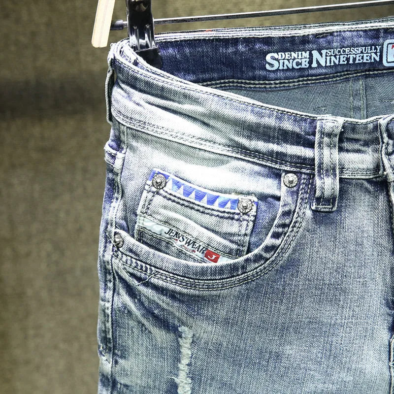 Men's light blue cotton ripped straight-leg jeans with a casual leisure style