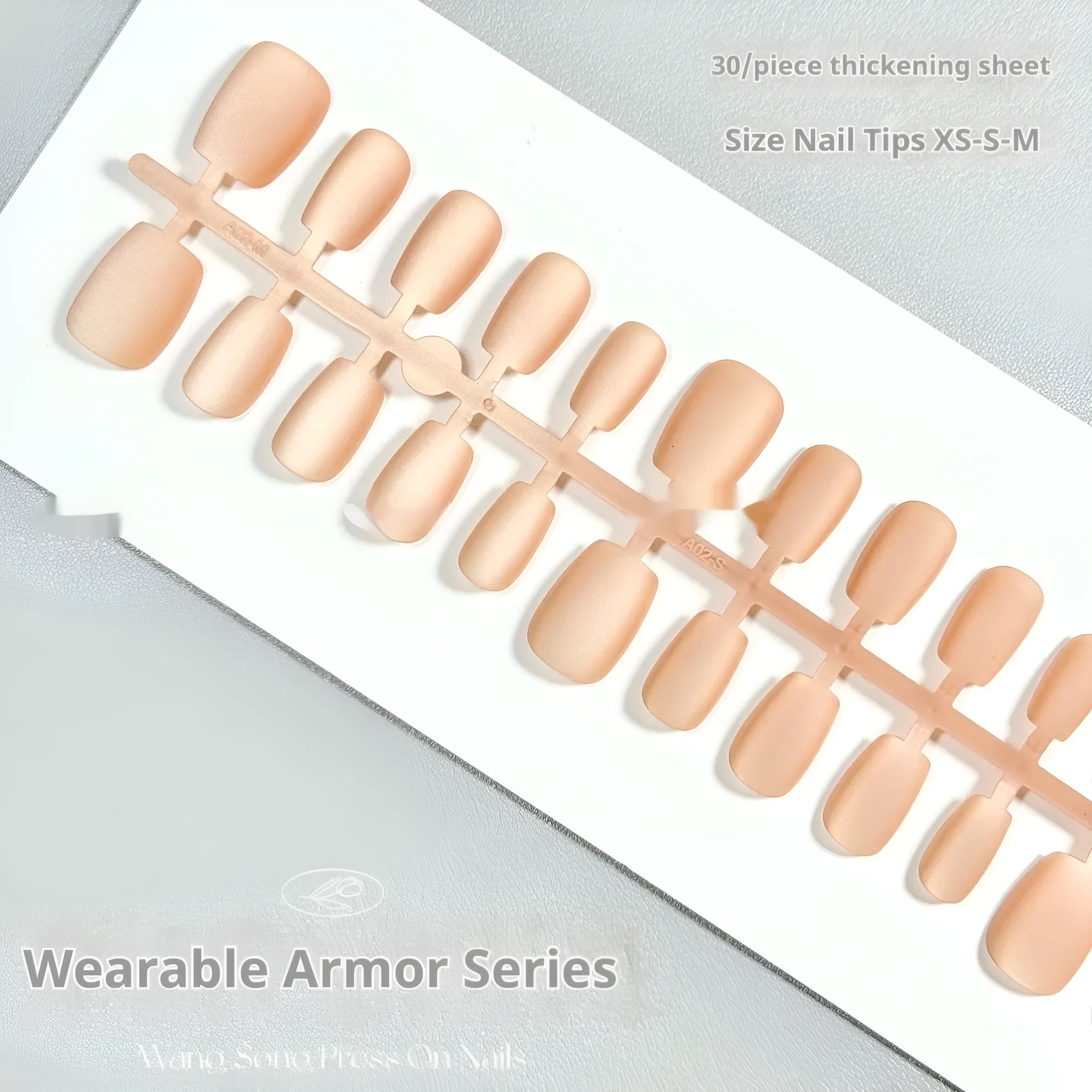 Set of velvet frosted Cat's Eye false nails with Aurora armour effect, showing short ladder sizes XS, S, and M.
