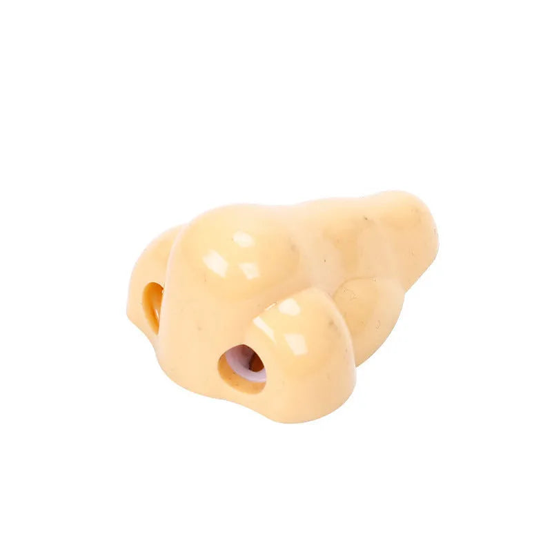 Flesh colour plastic pencil sharpener with geometry shape