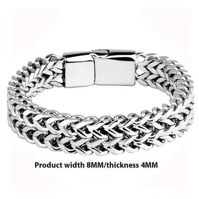 Men's geometric stainless steel bracelet showing front and back patterning with silver finish