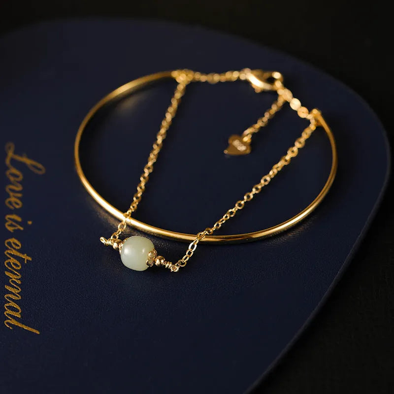 Women's Hetian jade lucky beads bracelet with gold inlay, showing single, double, and three bead style options.