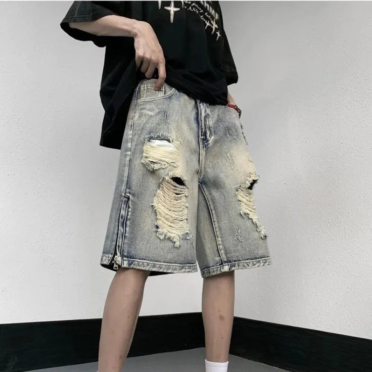 Blue retro-style denim shorts with a loose wide-leg fit on a mannequin.