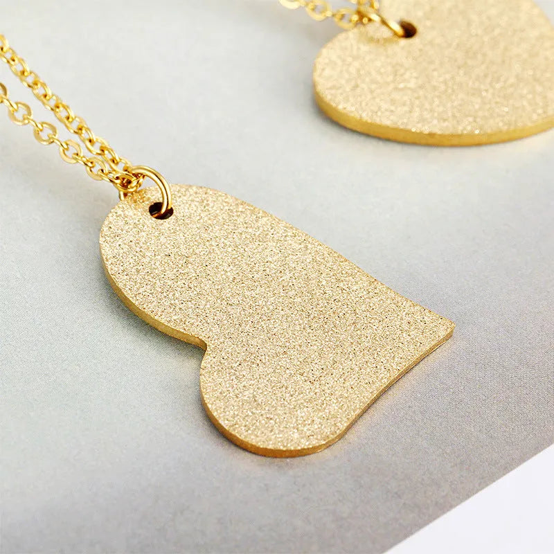 Geometric heart-shaped titanium steel pendant necklace in colour KN25736-Z.