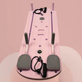Multi-functional supine board wheel equipment in dark purple and pink for abdominal exercise