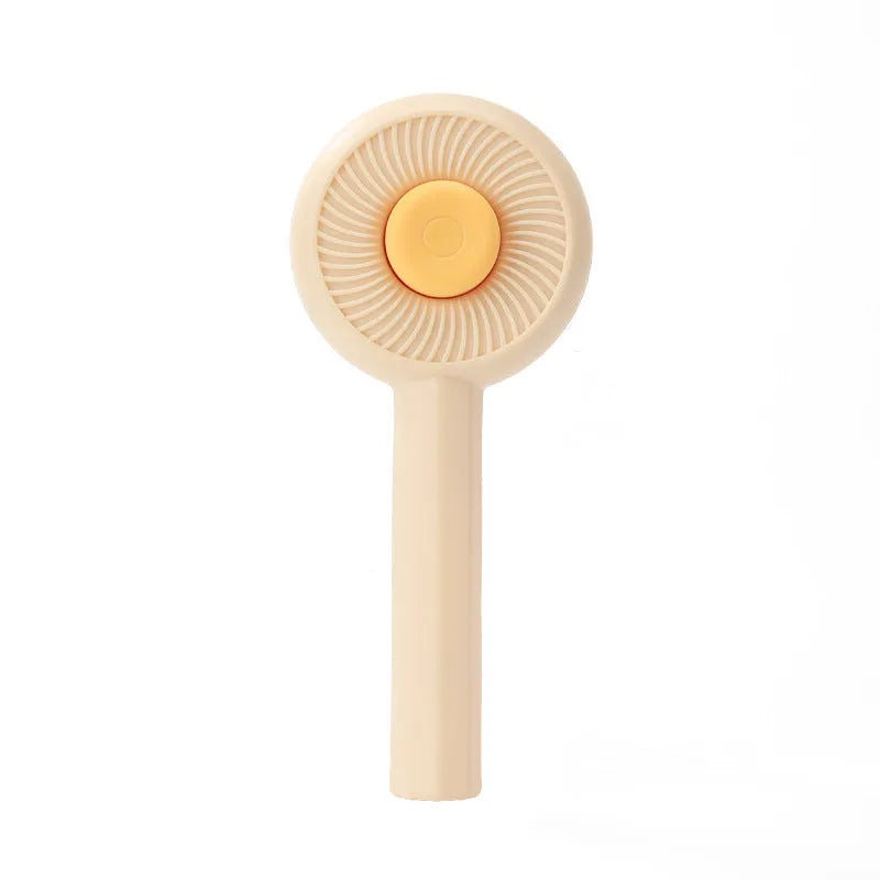 Blue pet grooming brush with self-cleaning button and angled wire needles for cats and dogs