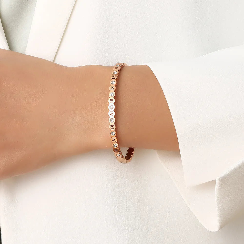 Korean style titanium steel bracelet with number detail in a choice of gold, rose gold, or steel colour.
