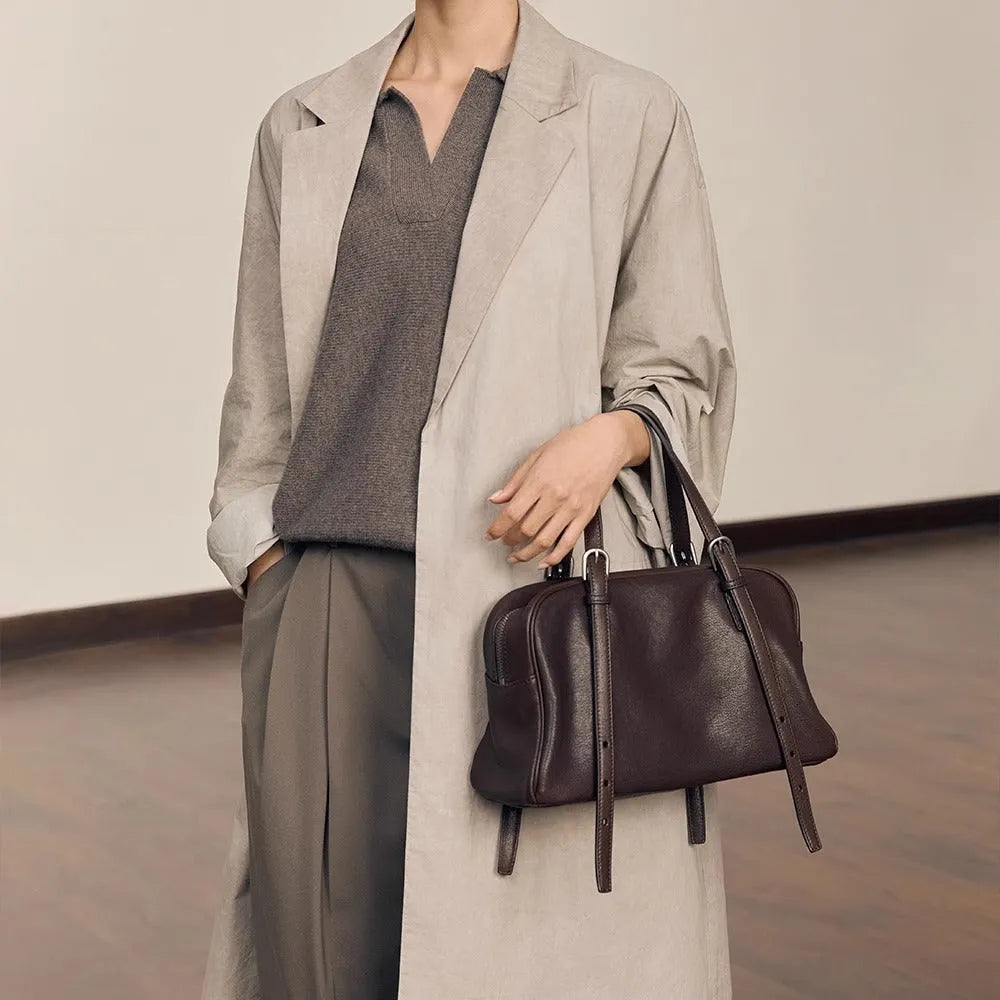 Women's genuine leather retro shoulder bag in horizontal square shape with double straps.
