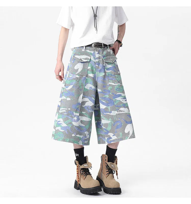 Cropped camouflage colour denim work trousers with straight leg and zipper fly on a mannequin