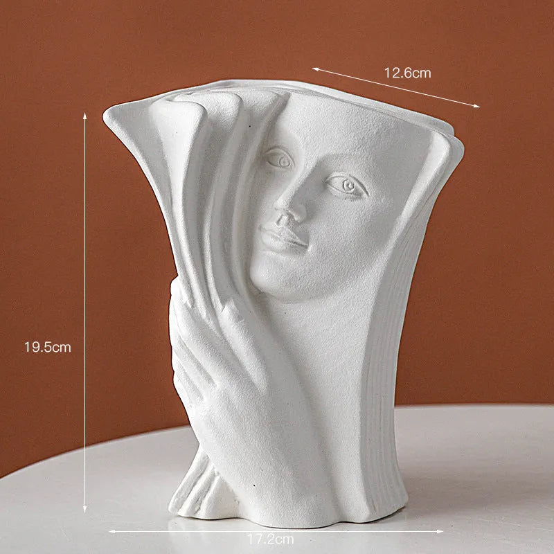 Glazed ceramic book stand in modern simplicity style on a desktop.