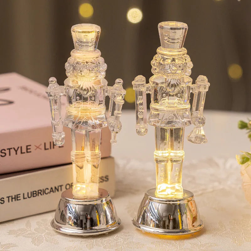 Transparent plastic walnut soldier nutcracker Christmas ornament in traditional design.