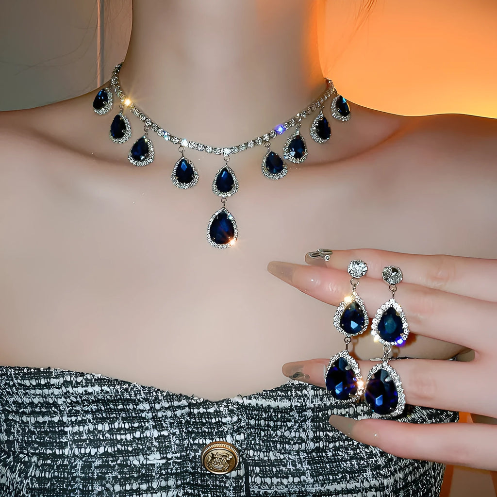 Silver needle water drop earrings and necklace set in blue and silver blue with alloy and zircon pendant