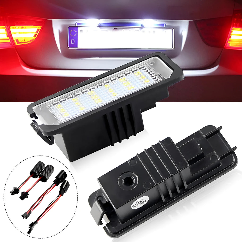 Pair of white LED license plate light bulbs for Volkswagen cars with Canbus resistors.