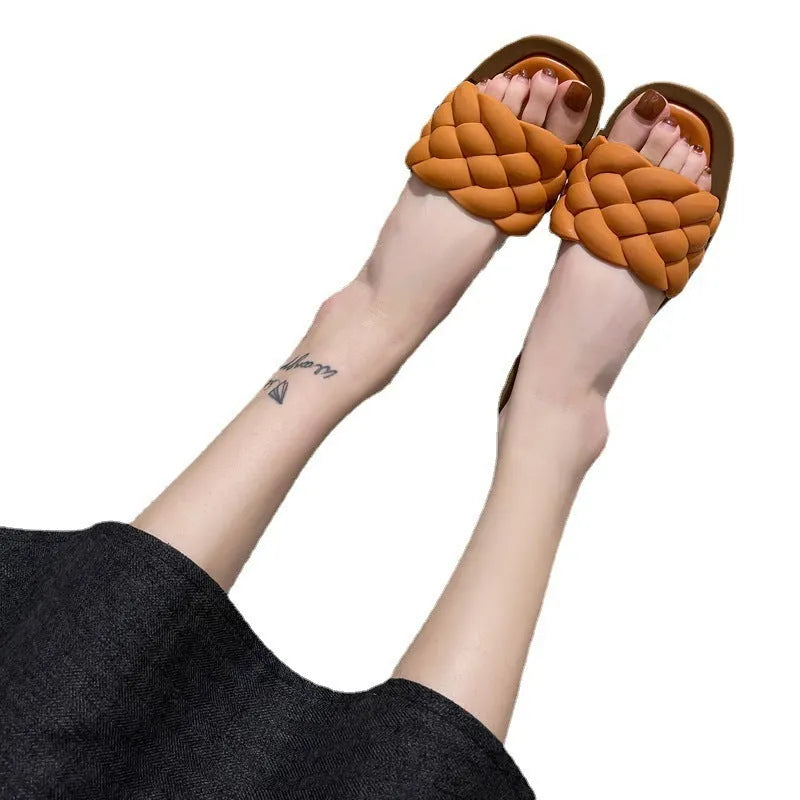 Women's plaid PVC beach sandals with thick anti-skid soles in black, green, orange and white.