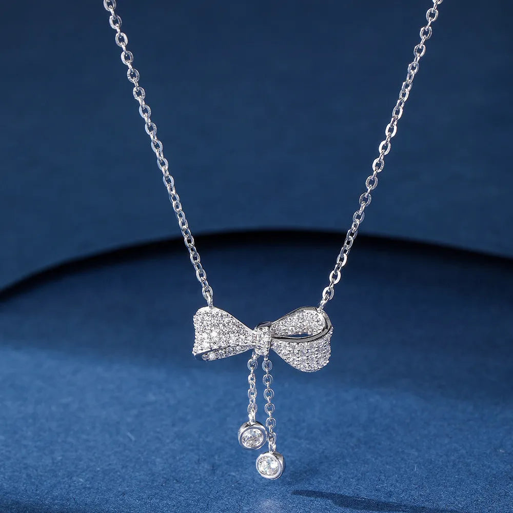 S925 sterling silver bow necklace on adjustable O-ring chain