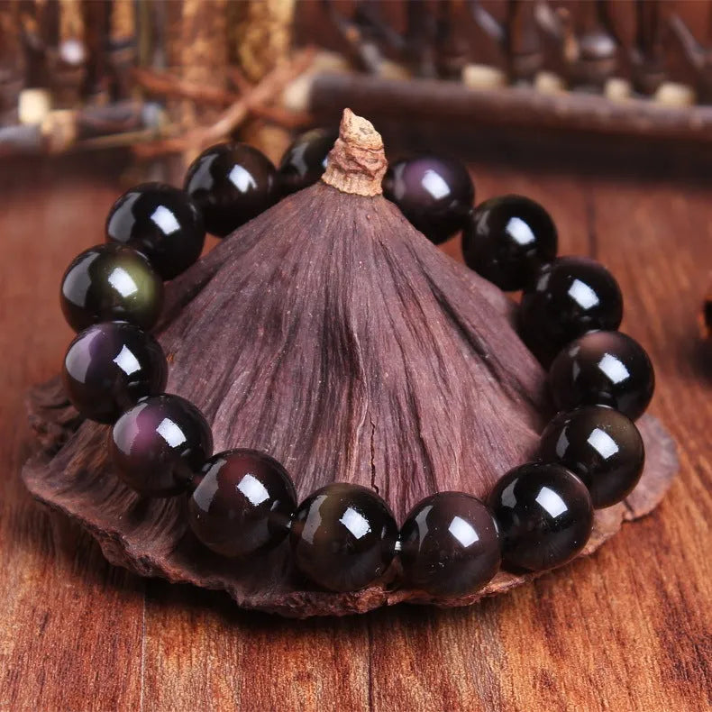 Natural icy obsidian Pi Xiu bracelet with double-eye ice stone colour on a geometric bead design.