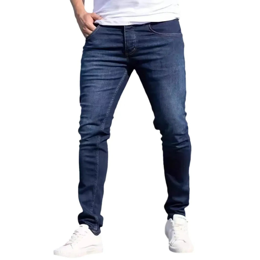 Men's dark blue slim fit cotton jeans with skinny style and mid-waist design
