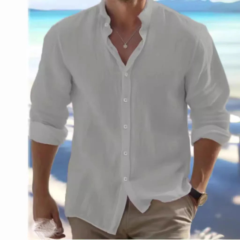 Men's white linen button-up summer beach shirt with collar on a hanger.