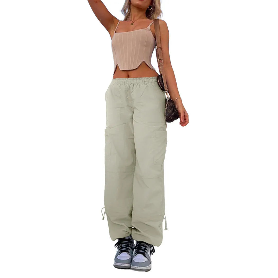 Multi-pocket cargo casual pants in a loose fit, shown in a neutral colour like grey or khaki.