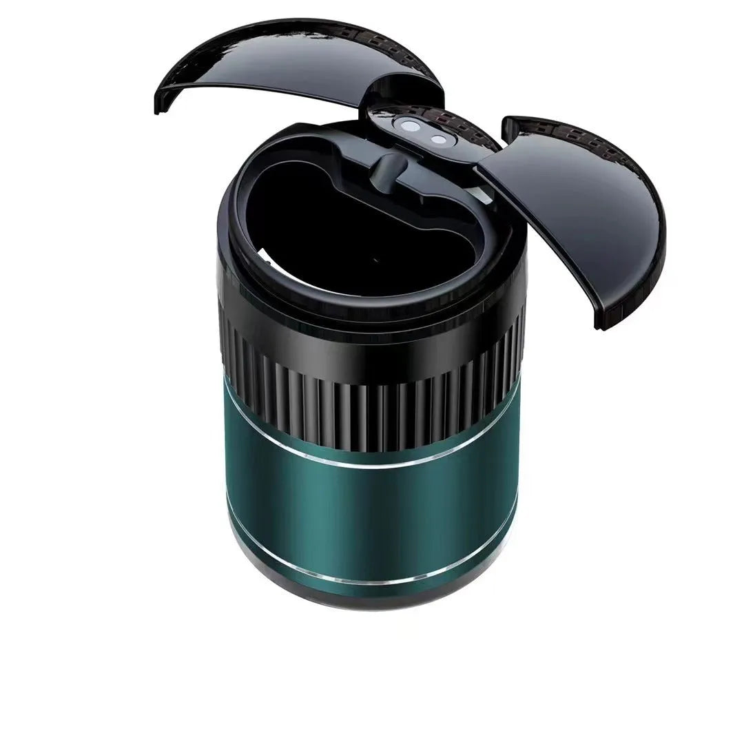 Black smart infrared metal car ashtray with lid on a car dashboard.