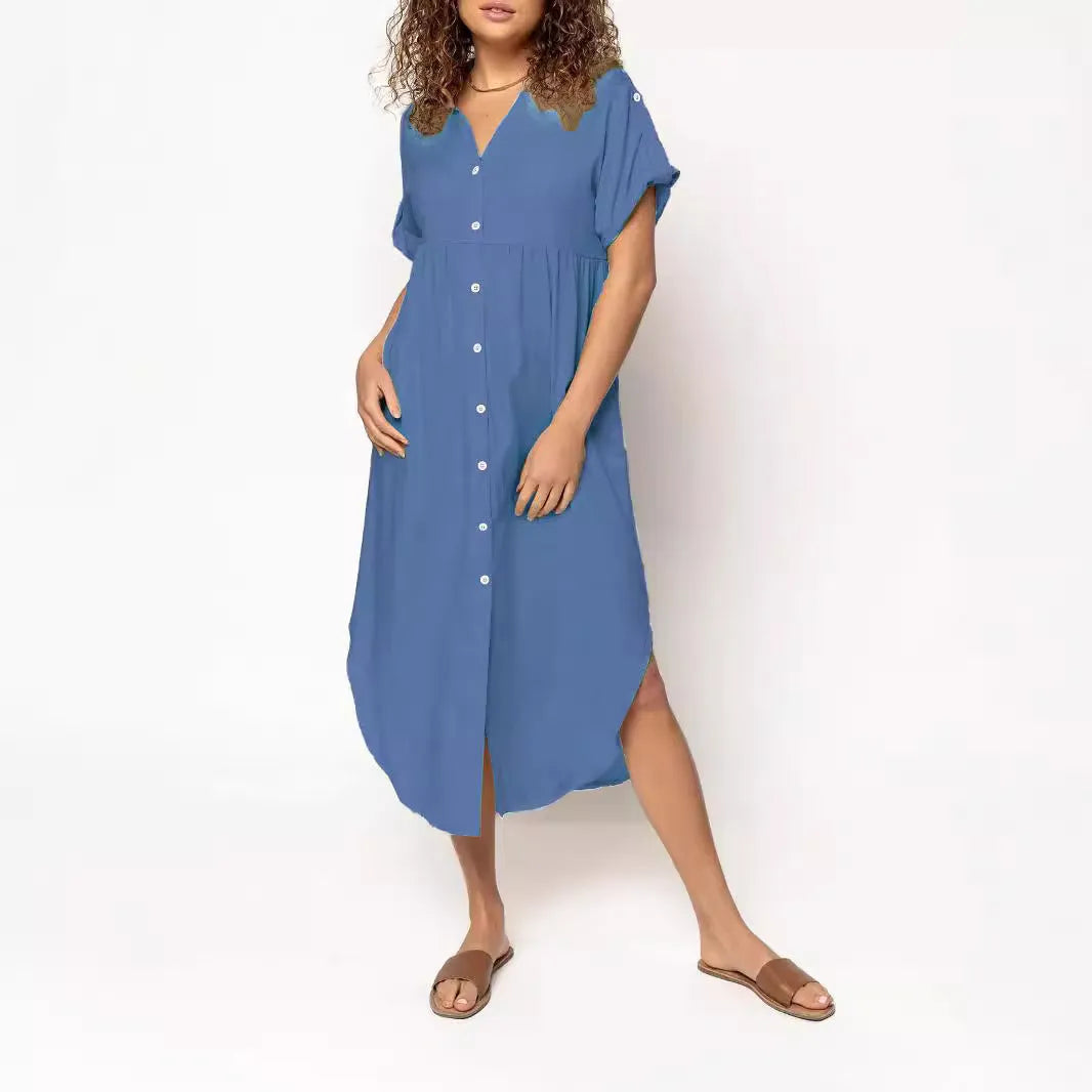 Loose-fitting casual solid colour button dress in a mid-length style on a hanger.