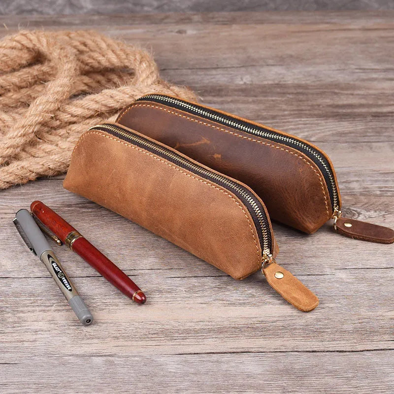 Handmade cowhide leather pencil case in rectangular shape with zipper closure