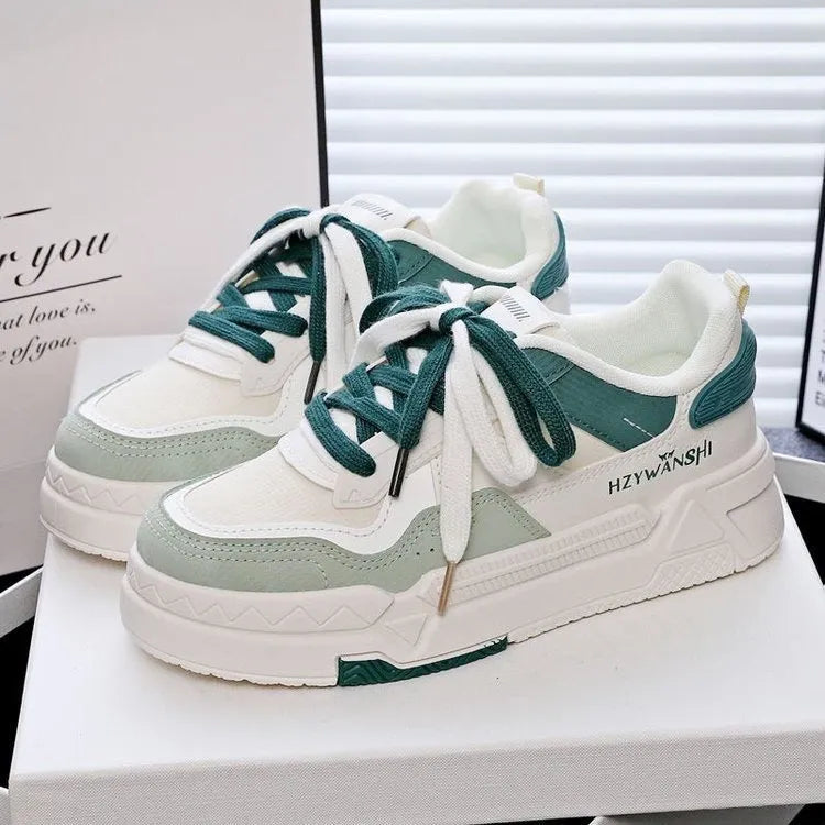 Children's board shoes with thick rubber soles and cross shoulder straps on synthetic leather upper