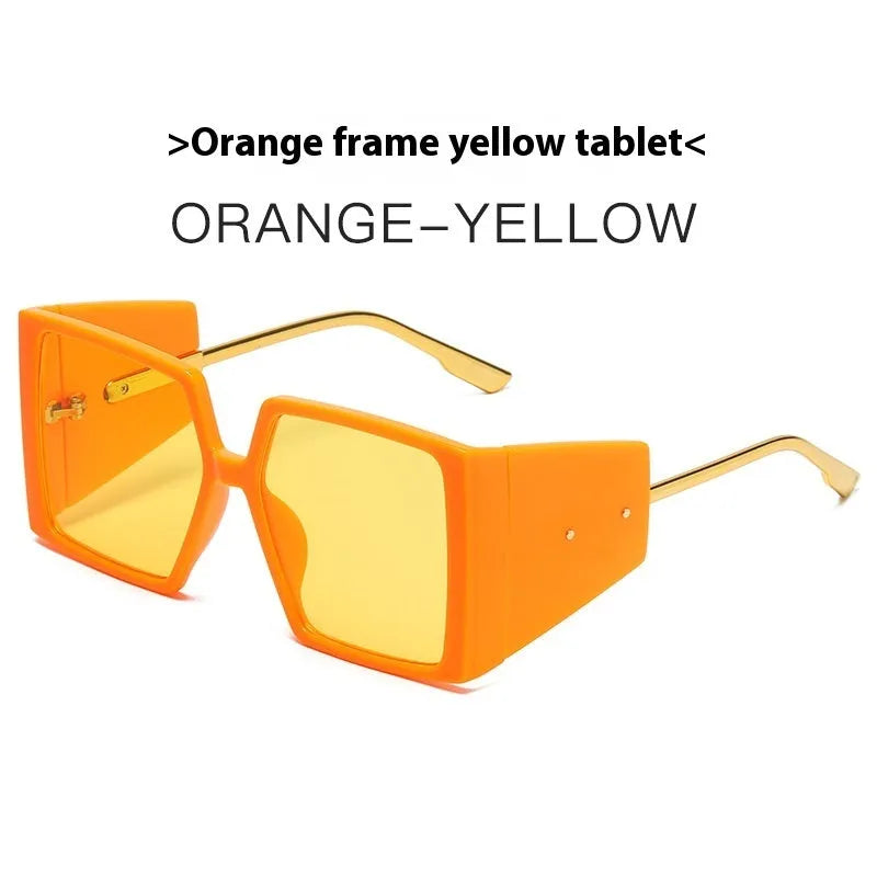 A pair of large square frame sunglasses on a white background, showing the oversized silhouette.