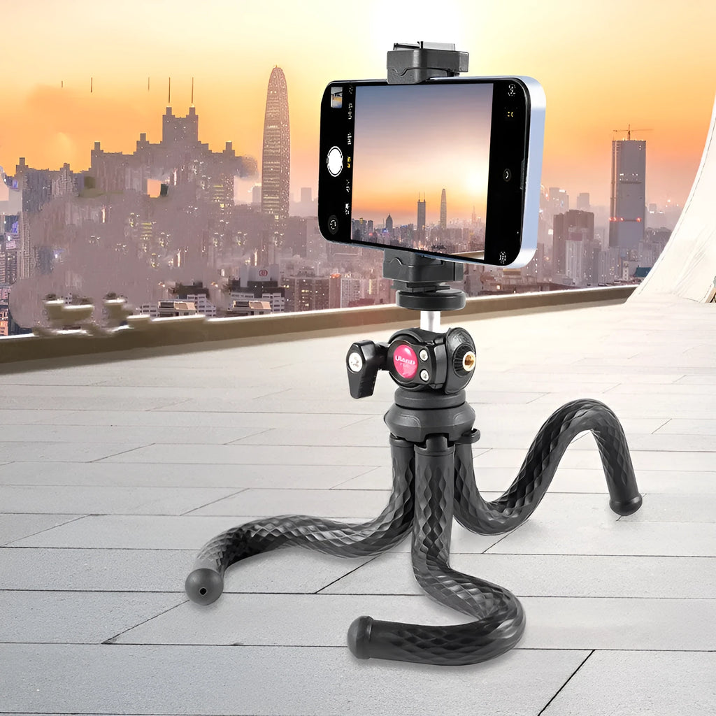 Black octopus-leg mobile phone tripod set with extended aluminium centre column and attached phone clip.