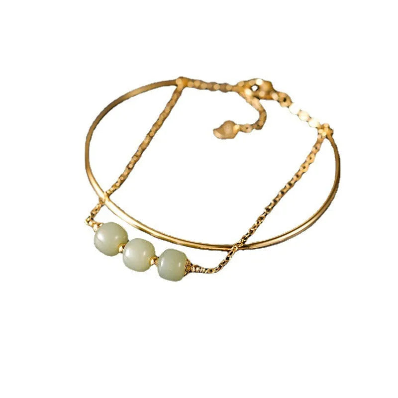 Women's Hetian jade lucky beads bracelet with gold inlay, showing single, double, and three bead style options.