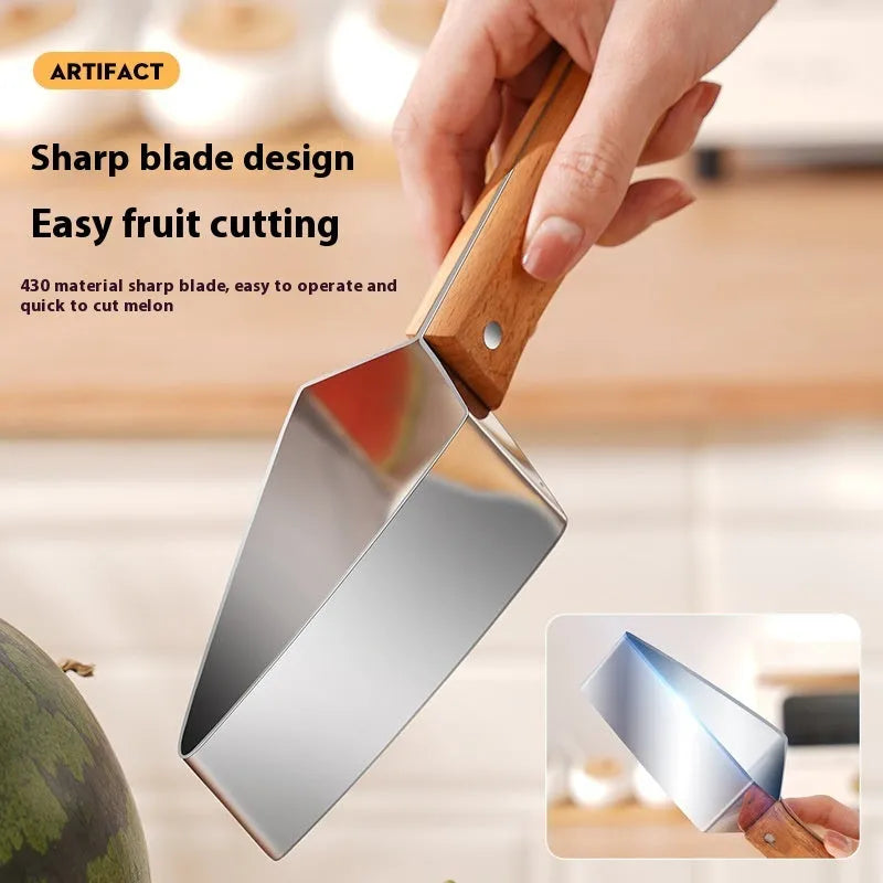 Stainless steel watermelon splitter with triangle cutting piece and protective cover on a kitchen counter.