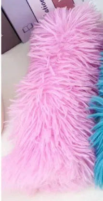 Blue, green, pink, and white plush cat toy pillow measuring 27cm by 10cm.