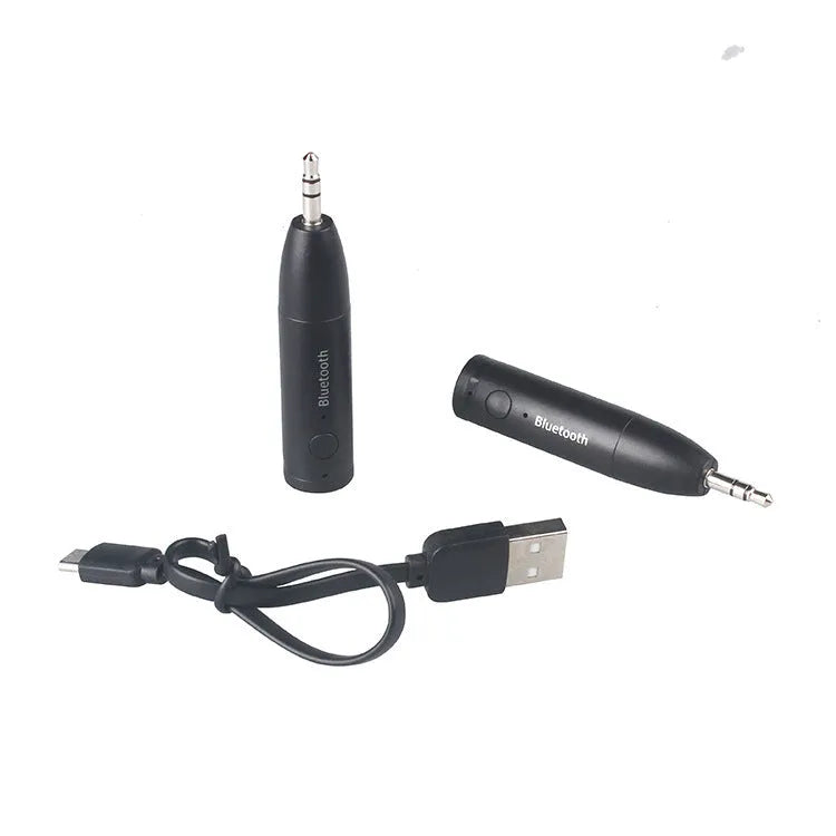 Black AUX Bluetooth 5.0 audio receiver for car stereo with USB charging cable