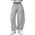 Women's loose cropped sweatpants with drawstring elastic waist and side pockets in street fashion style