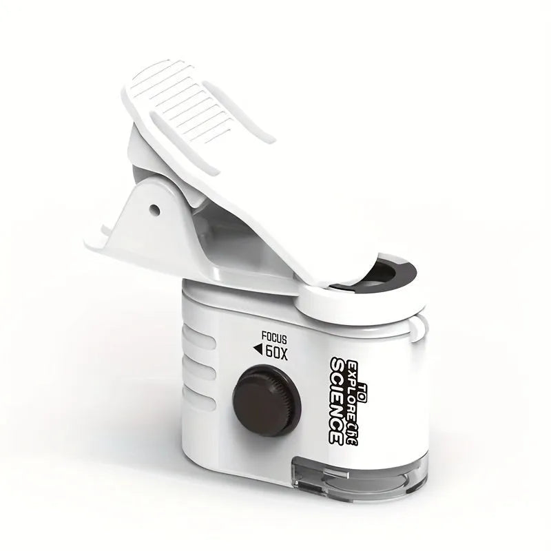 Mini 60x magnification smartphone microscope with LED light and detachable clip on a mobile phone