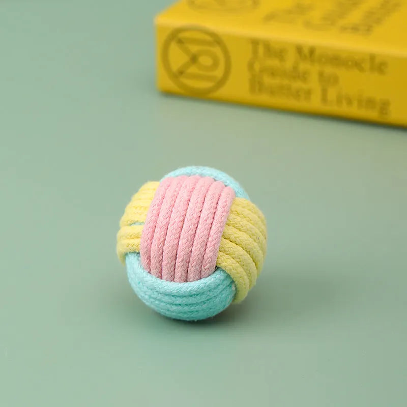 Handmade cotton cat hairball plush toy in blue-pink, green-blue, or pink-green colours, 5cm in diameter.