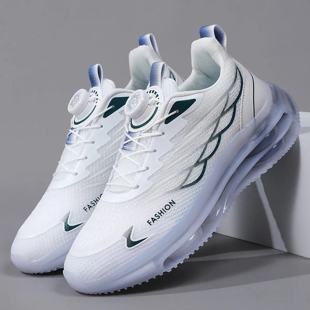 Men's white low-top casual sneakers with mesh upper, rotating button, and rubber sole.