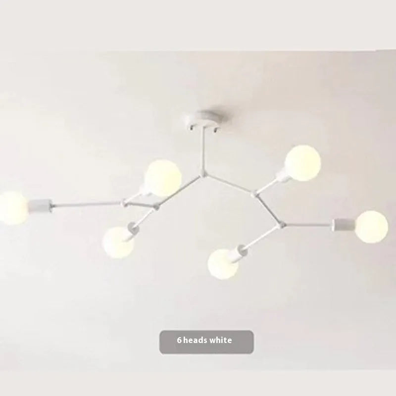 Nordic style iron ceiling chandelier with multiple black heads against a white background.