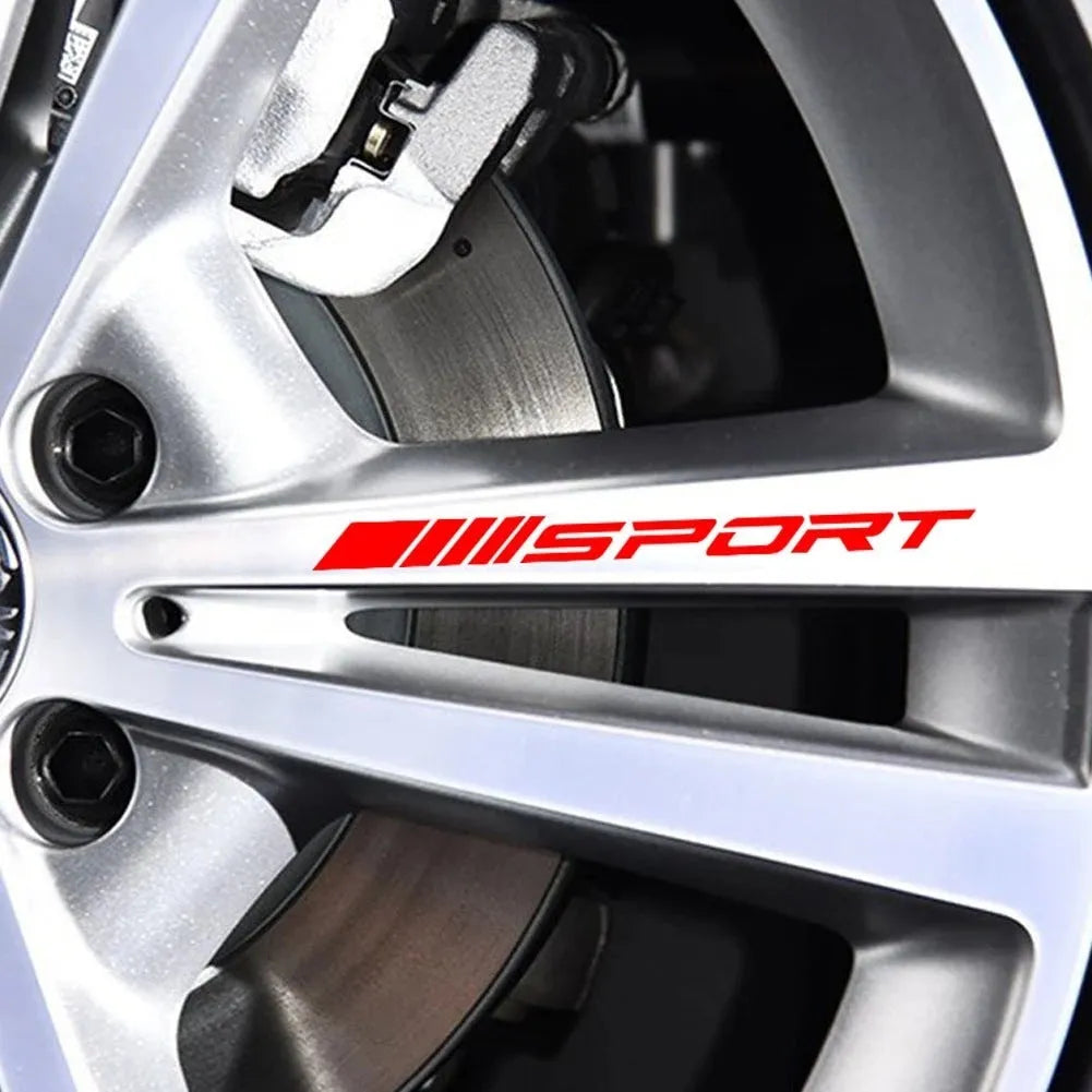 Hollow design red car rim sticker on alloy wheel, measuring 10cm long.